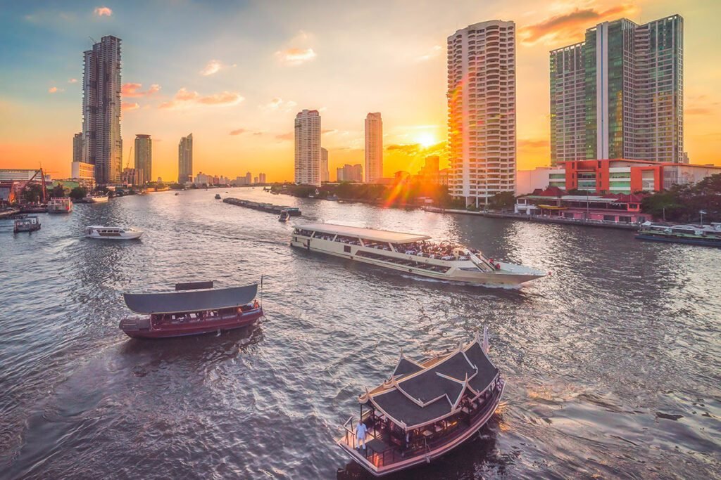 Cruises-in-Bangkok-Chaophraya-river-with-boats-aerial-view